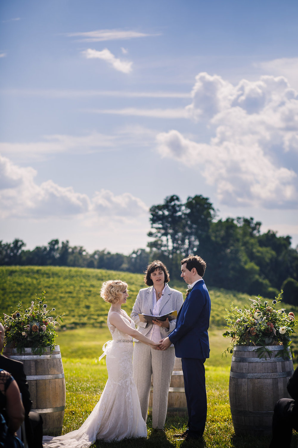 brielle-davis-events-photography-by-brea-linganore-winery-james-sarah-wedding-ceremony-bride-and-groom-at-alter.jpg