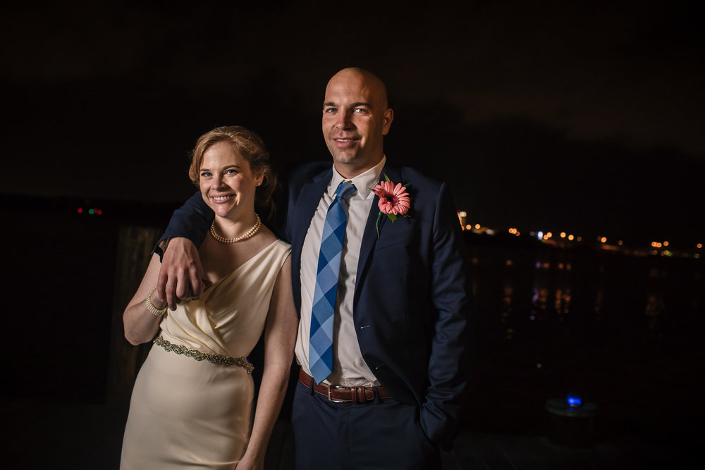 brielle-davis-events-torpedo-factory-wedding-photography-by-brea-bride-and-groom-at-night-waterfront.jpg