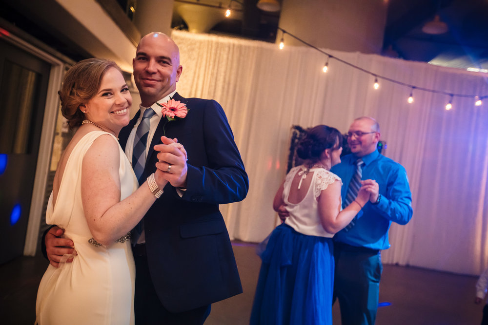 brielle-davis-events-torpedo-factory-wedding-reception-bride-and-groom-dancing-photography-by-brea.jpg
