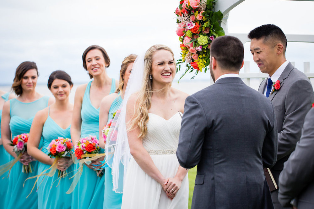 brielle-davis-events-weatherly-farm-waterfront-wedding-ceremony-bride-listening-to-vows.jpg