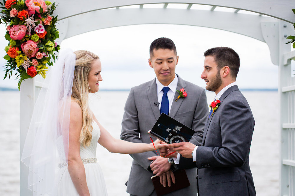 brielle-davis-events-weatherly-farm-waterfront-wedding-ceremony-groom-reading-vows.jpg