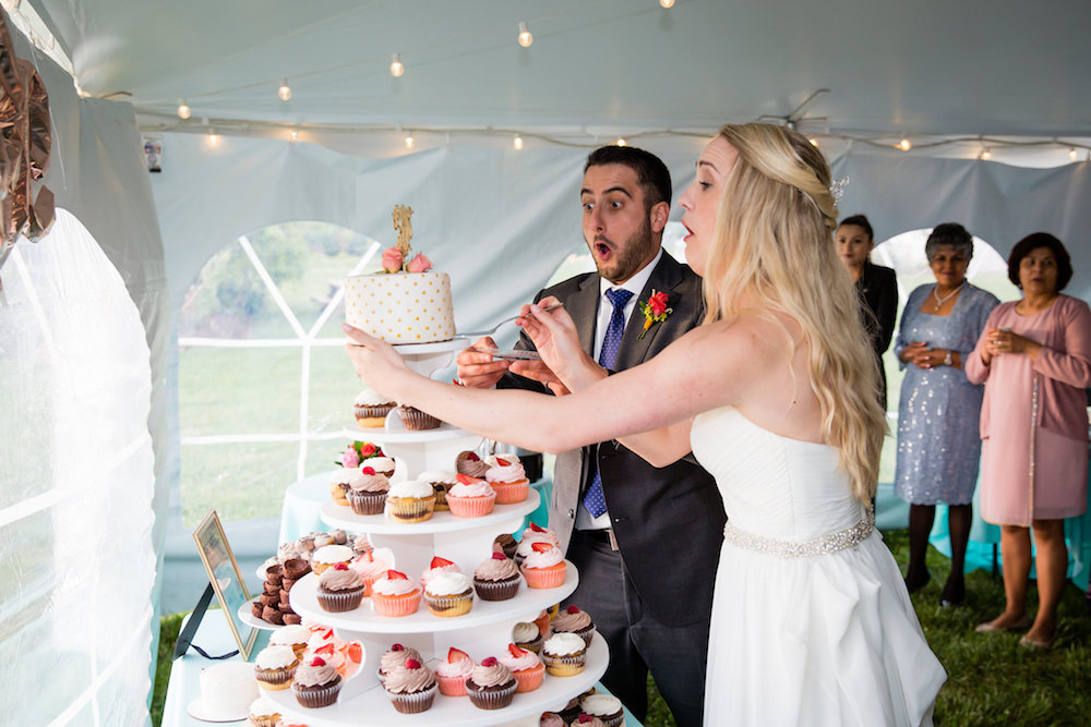 brielle-davis-events-weatherly-farm-waterfront-wedding-reception-cake-falling.jpg